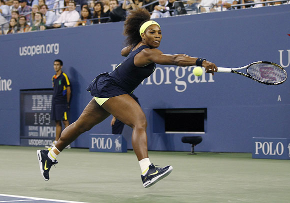Serena Williams returns a shot to Coco Vandeweghe during their first round match on Tuesday
