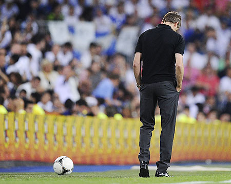 Barcelona coach Tito Vilanova looks a dejected man after the Super Cup second leg match on Wednesday