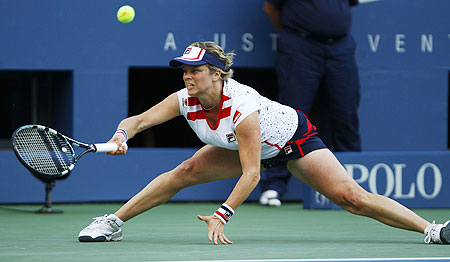 Kim Clijsters of Belgium hits a return to Laura Robson of Britain