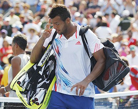 Jo-Wilfried Tsonga leaves the court after his loss to Martin Klizman of Slovakia on Thursday
