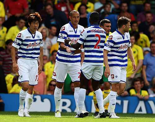 Bobby Zamora of QPR is congratulated on his goal during the Barclays Premier League match against Norwich City