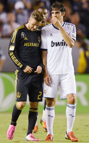 David Beckham of Los Angeles Galaxy (left) with  Kaka of Real Madrid
