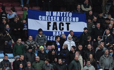 Chelsea fans raise a banner during the Barclays Premier League match between West Ham United and Chelsea at the Boleyn Ground
