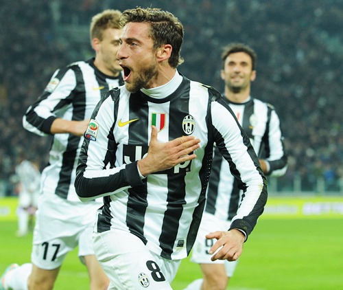 Claudio Marchisio (centre) of Juventus celebrates