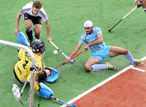 Gurwinder Singh Chandi battles for the ball