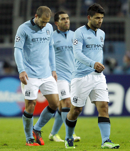 Manchester City's players leave the field after their Champions League group D match on Tuesday