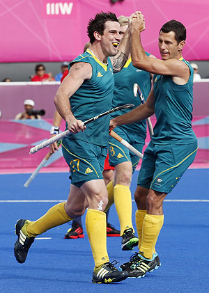 Australia's Kieran Govers (left) celebrates with teammate Jamie Dwyer