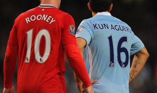 Wayne Rooney of Manchester United and Sergio Aguero of Manchester City