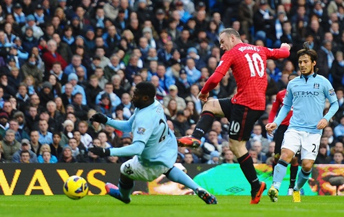 Wayne Rooney of Manchester United scores the second goal