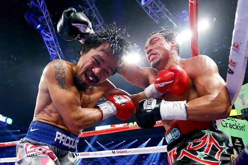 Manny Pacquiao and Juan Manuel Marquez exchange blows