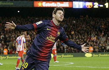 Barcelona's Lionel Messi celebrates scoring against Atletico Madrid during their La Liga match on Sunday