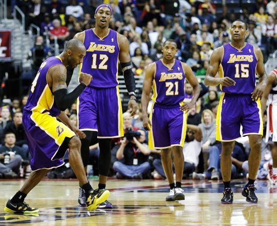 Kobe Bryant celebrates with his Los Angeles Lakers team-mates
