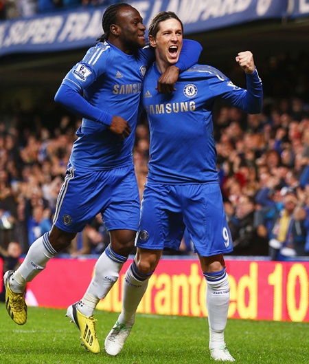 Fernando Torres of Chelsea (right) celebrates with Victor Moses