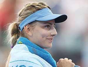 Ksenia Pervak of Kazakhstan celebrates winning her match against Caroline Wozniacki of Denmark on Monday