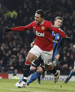 Manchester United's Javier Hernandez (left) celebrates after scoring against Stoke City during their EPL match on Tuesday