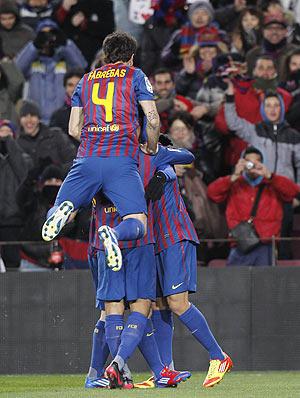 Barcelona players celebrate after scoring