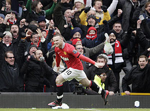 Wayne Rooney celebrates after scoring against Liverpool on Saturday
