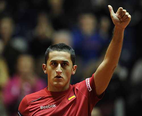 Spain's Nicolas Almagro celebrates after beating Kazakhstan's Evgeny Korolev during their Davis Cup match in Oviedo
