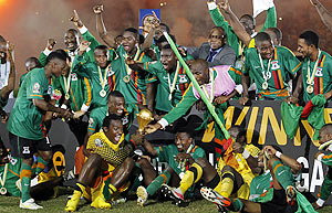 Zambia's football team celebrate after defeating Ivory Coast to win the 2012 African Cup of Nations Cup on Sunday