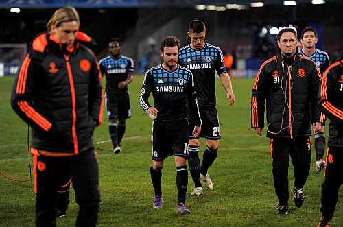 Chelsea players leave the field dejected after they were beat by Napoli during their Champions League last 16 first leg match at the San Paolo stadium