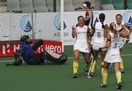 Dirkie Chamberlain (c) celebrates after scoring