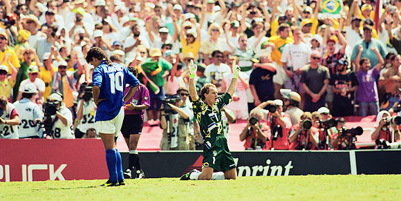 Goalkeeper Taffarel of Brazil celebrates after Roberto Baggio of Italy misses his penalty