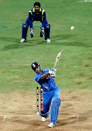 India Captain Mahendra Singh Dhoni hits a six to win the 2011 World Cup for India in Mumbai in April last year