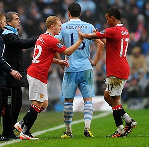 Paul Scholes of Manchester United comes on as a substitute during the FA Cup Third Round match against Manchester City on  Sunday