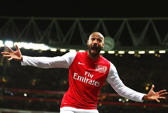 Arsenal striker Thierry Henry celebrates scoring during the FA Cup third round match against Leeds United
