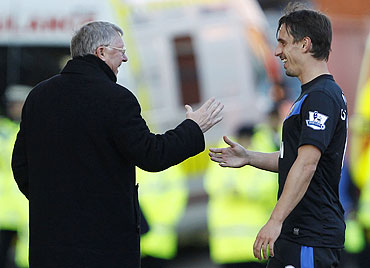 Gary Neville with Alex Ferguson