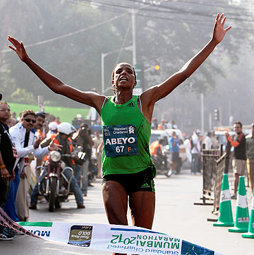 A jubilant Netsanet Abeyo of Ethiopian on crossing the finish line