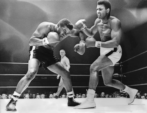 Cassius Clay (Muhammad Ali) spars with challenger Floyd Patterson during the World Heavyweight Championship fight. Clay won the fight with a technical knockout in the 12th round in November 1965