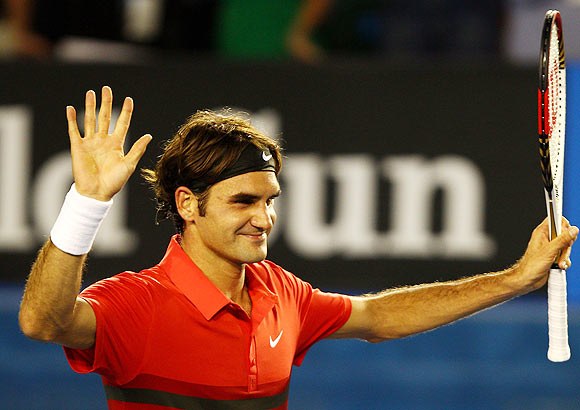 Federer ends Tomic's dream run