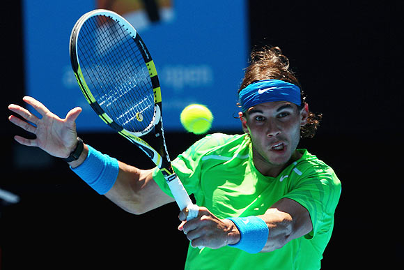 Nadal keeps fingers crossed after reaching quarters