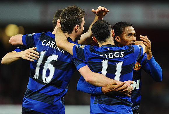 Antonio Valencia of Manchester United (right) celebrates with team-mates