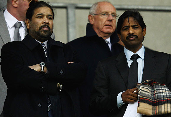 Blackburn Rovers owners Indian brothers Balaji Rao (left) and Venkatesh Rao (right), Directors of Venky's look on during the Barclays Premier League match