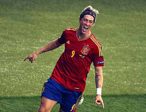 Spain's Fernando Torres celebrates his goal against Italy during their Euro 2012 final match at the Olympic Stadium in Kiev