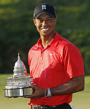 Tiger Woods with the trophy after winning the AT&T National golf tournament in Maryland on Sunday