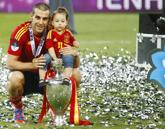 Euro photos: Kiddies party after dads' triumph