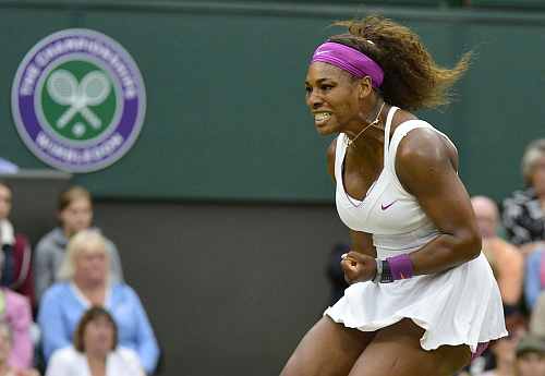 Serena Williams of the U.S. reacts during her women's quarter-final tennis match against Petra Kvitova of the Czech Republic at the Wimbledon