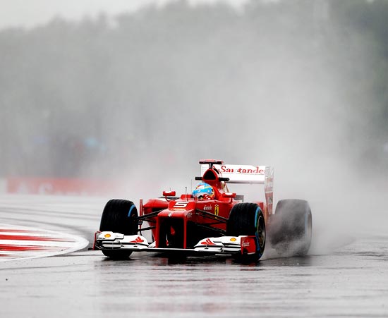 Ferrari's Fernando Alonso drives during practice for the British Grand Prix
