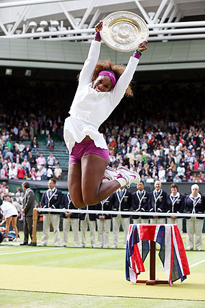 Serena Williams is esctatic after beating Agnieszka Radwanska to win the Wimbledon Championships on Saturday