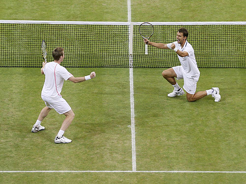 Jonathan Marray of Great Britain (left) and Frederik Nielsen of Denmark celebrate match point