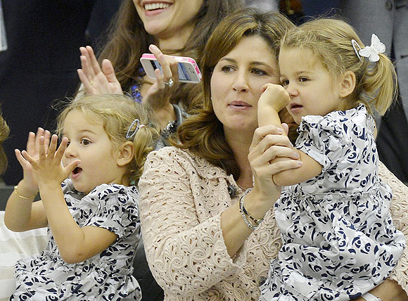 Roger Federer's  wife Mirka Federer with their two-year-old twins Charlene Riva and Myla Rose, after Federer's win on Sunday