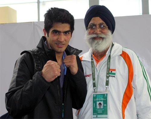 Gurbax Singh Sandhu with Vijender Singh