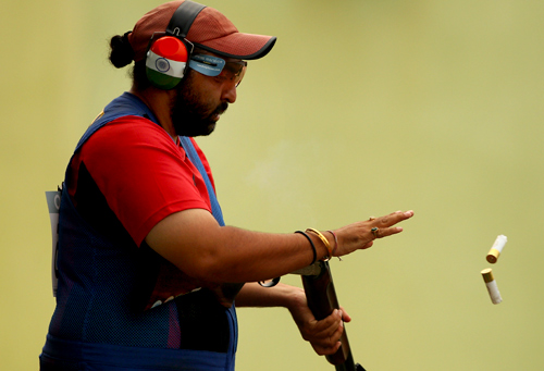 Ronjan Sodhi of India competes in the men's double trap at the Dr Karni Singh Shooting Range during day four of the Delhi 2010 Commonwealth Games