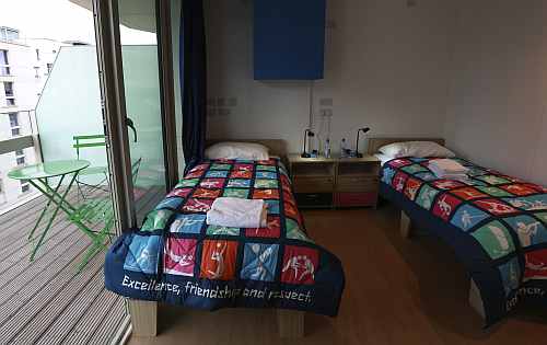 A twin bedroom and balcony in the Olympic Village built for the London 2012 Olympic Games in Stratford