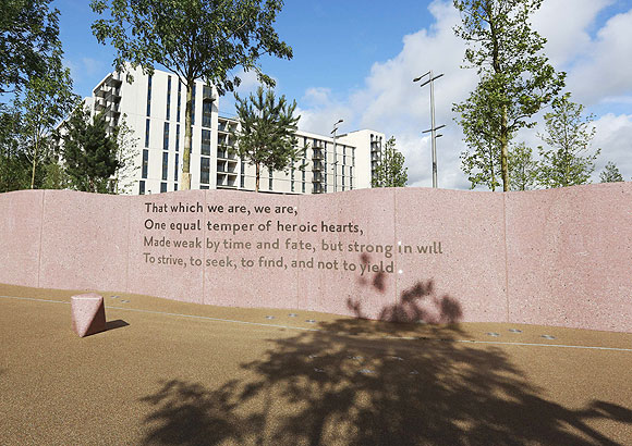 Words from a Ulysses poem by Alfred Tennyson are inscribed in the wall next to the Olympic Village Service Centre