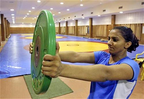 Indian wrestler Geeta Phogat, who is supported by Mittal Champions Trust, trains at a gym