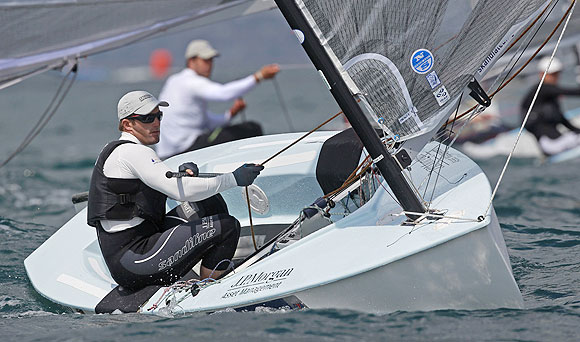 Britain's Ben Ainslie, who is competing in the Finn class, takes part in a practice race during the Weymouth and Portland International Regatta
